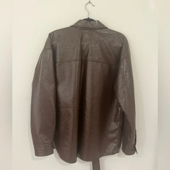 Aritzia Babaton Ava Vegan Leather Belted Shirt
Jacket Coffee Bean Brown - Picture 5 of 6